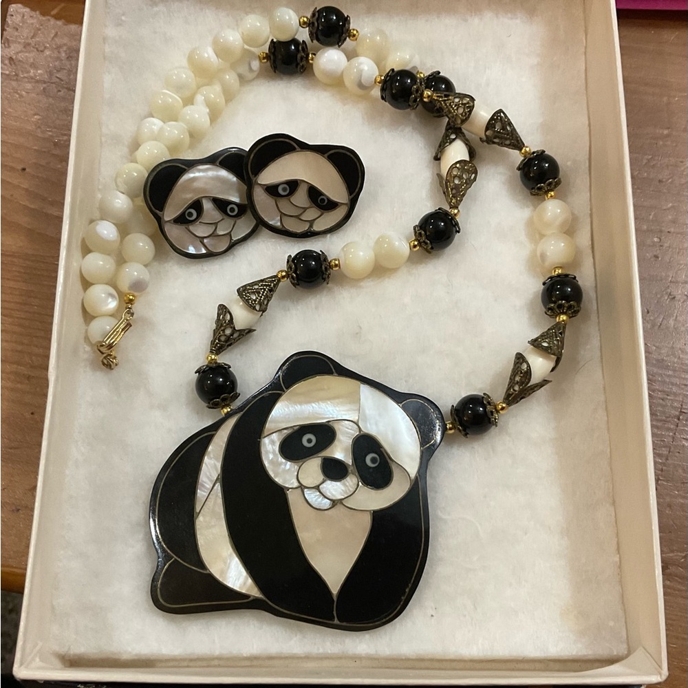 Lee Sands: vintage duo/set  of full body panda and pieced earrings together.
